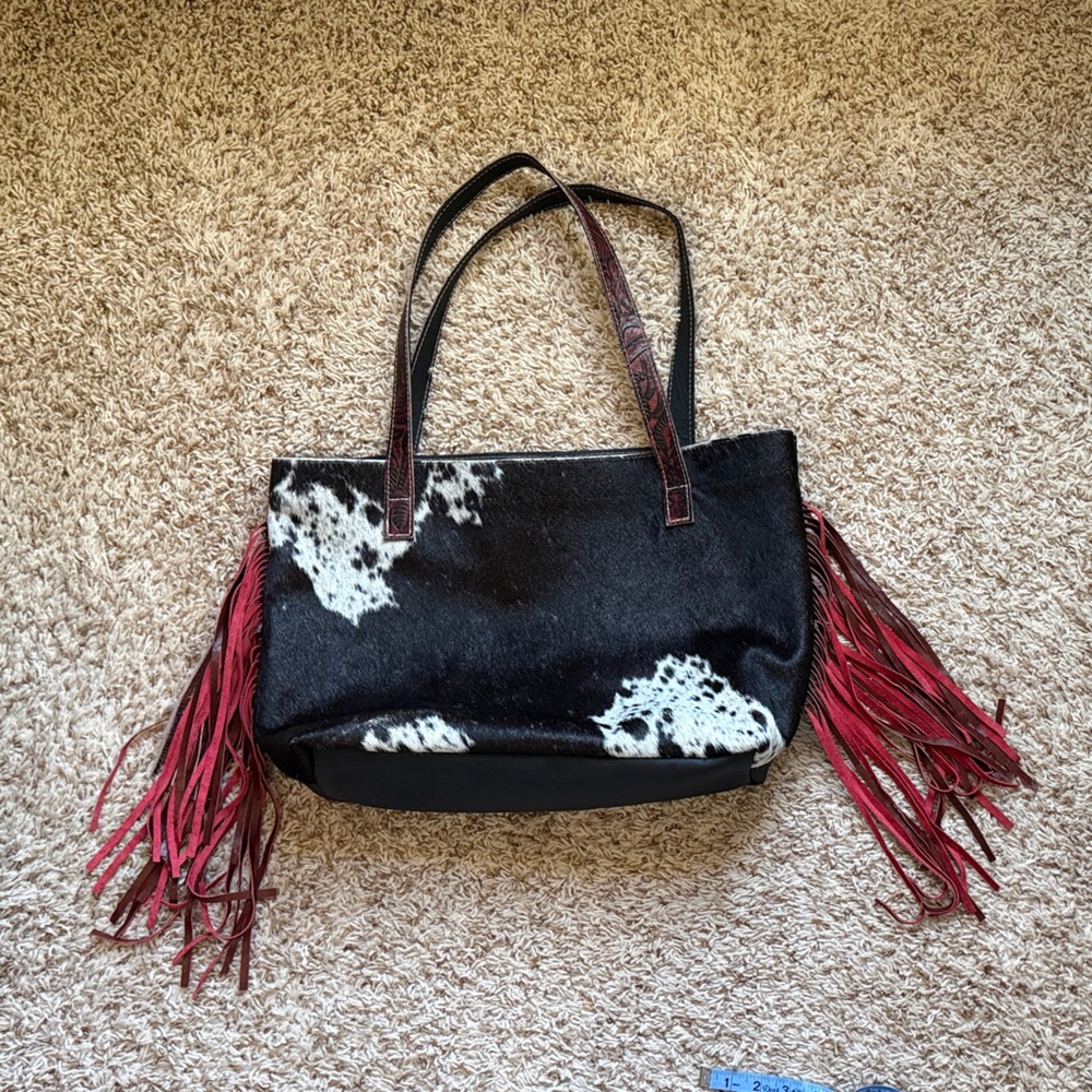 4w Custom Cowhide and leather Bag with Red Fringe.